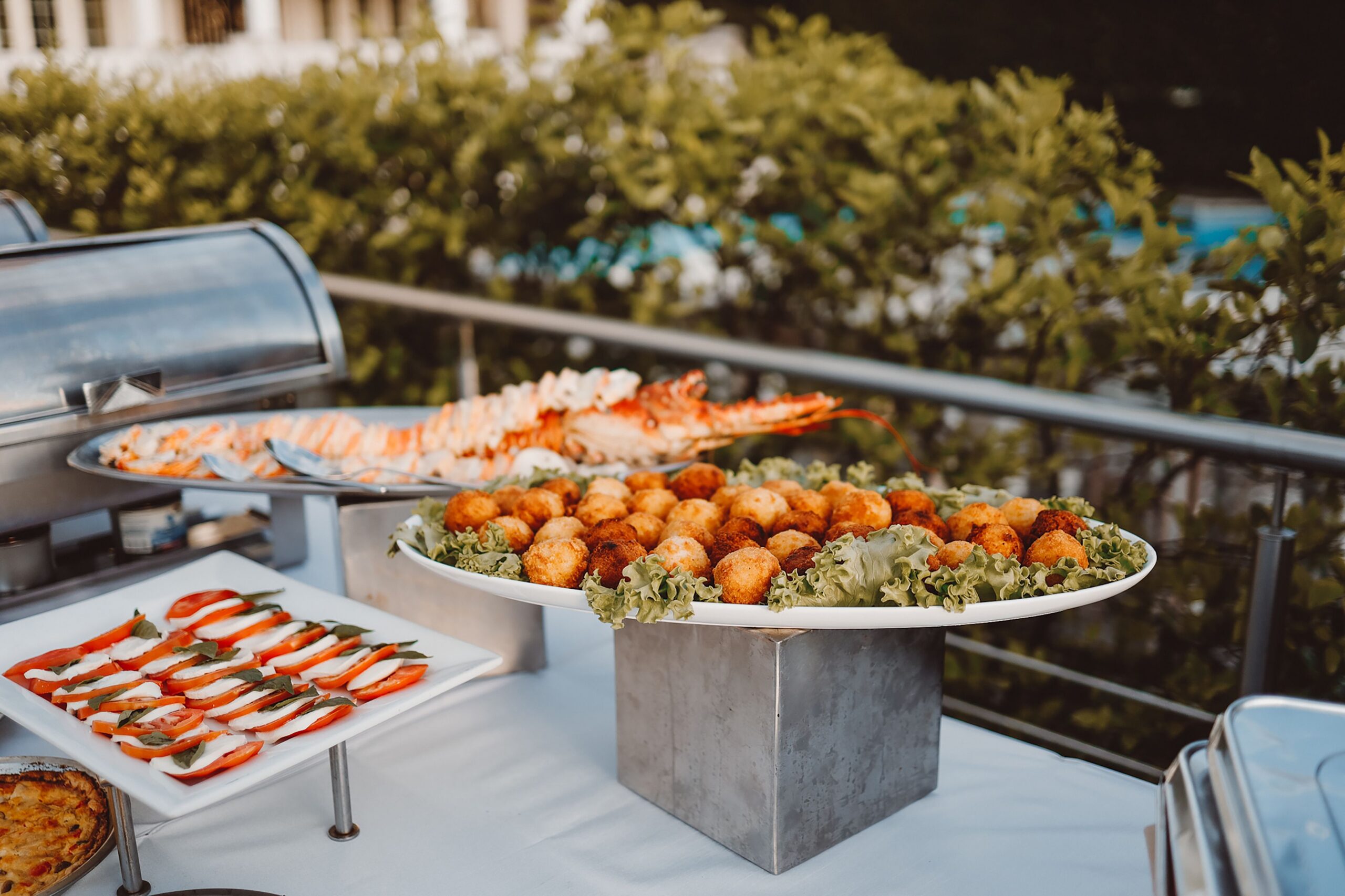Dishes of food set out on a buffet table