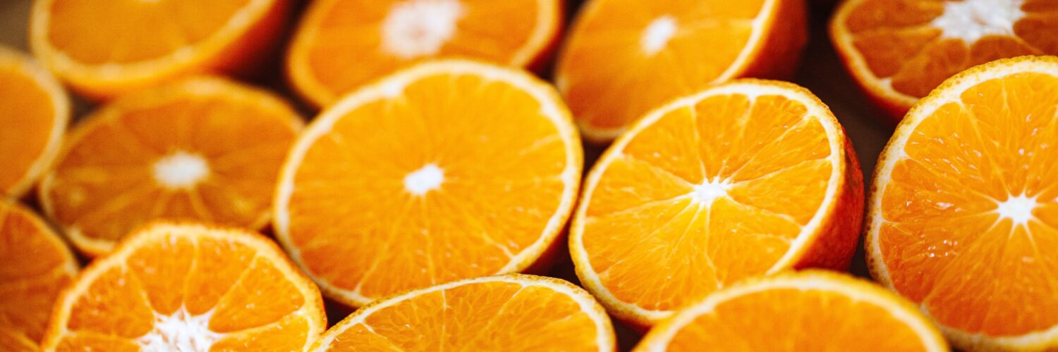 Close-up of freshly sliced oranges with juicy flesh