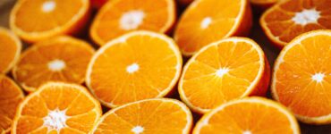 Close-up of freshly sliced oranges with juicy flesh